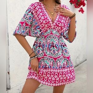 Fuchsia Boho Mini Dress with Ethnic Print - Batwing Sleeves and Gathered Waist.